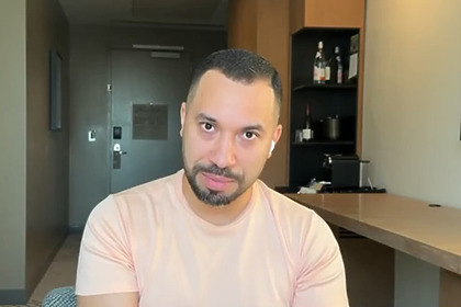 Gil do Vigor participando do Mais Você direto de um hotel nos Estados Unidos