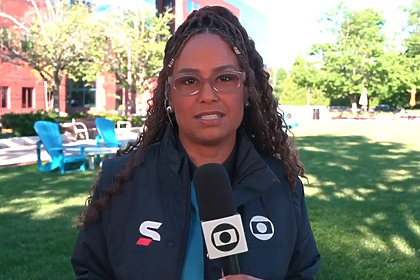 Karine Alves participando ao vivo Bom Dia Brasil nos Estados Unidos, falando sobre a Copa