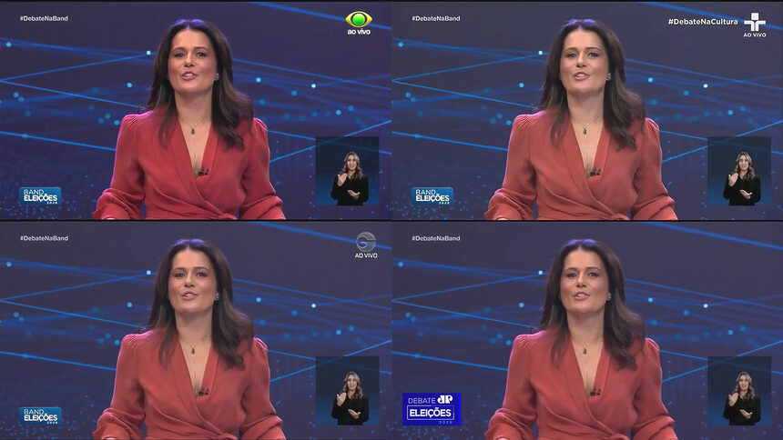 Adriana Araújo em pé apresentando o Debate na Band