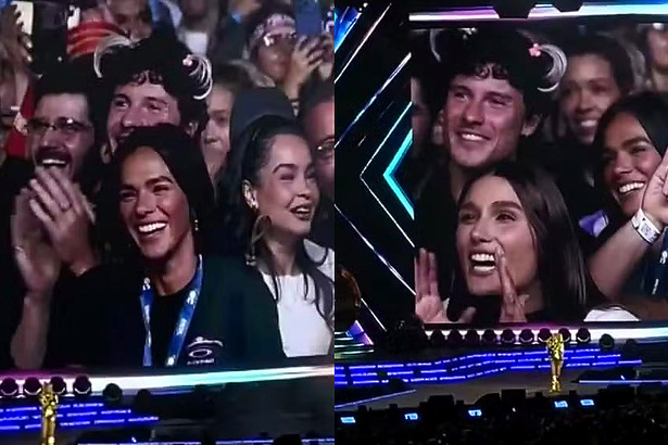 Shawn Mendes, com Xuxinha na cabeça, surge no telão do show de Xuxa ao lado de Sasha e Bruna Marquezine