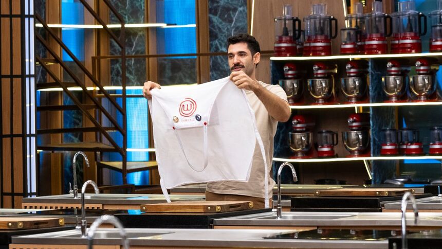 Patric deixando o avental na bancada após ser eliminado do MasterChef