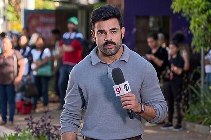 Túlio Amâncio em reportagem na Globo
